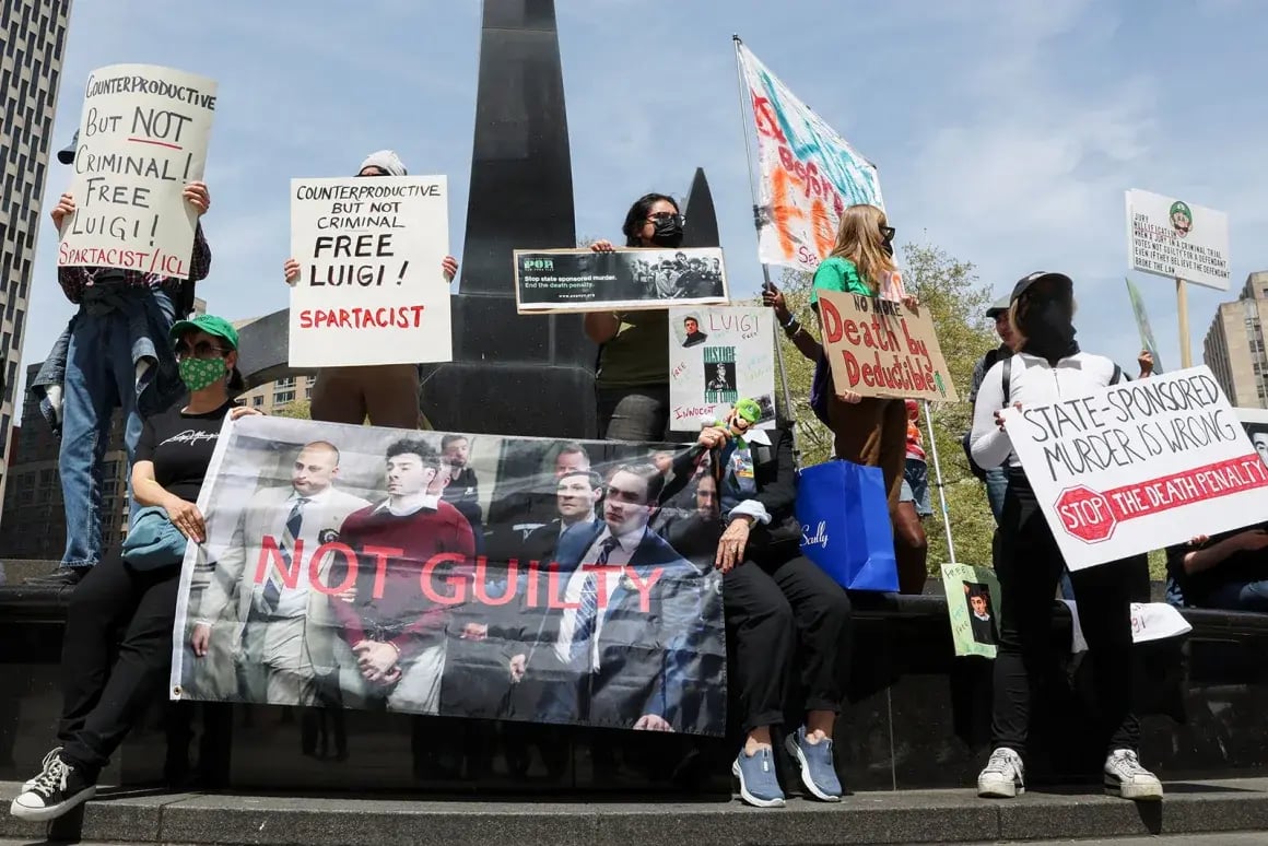 protesters with banner
